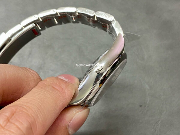 Clean Factory Rolex Oyster Perpetual 126000-0007 36mm Full 904L Red Dial - Image 5